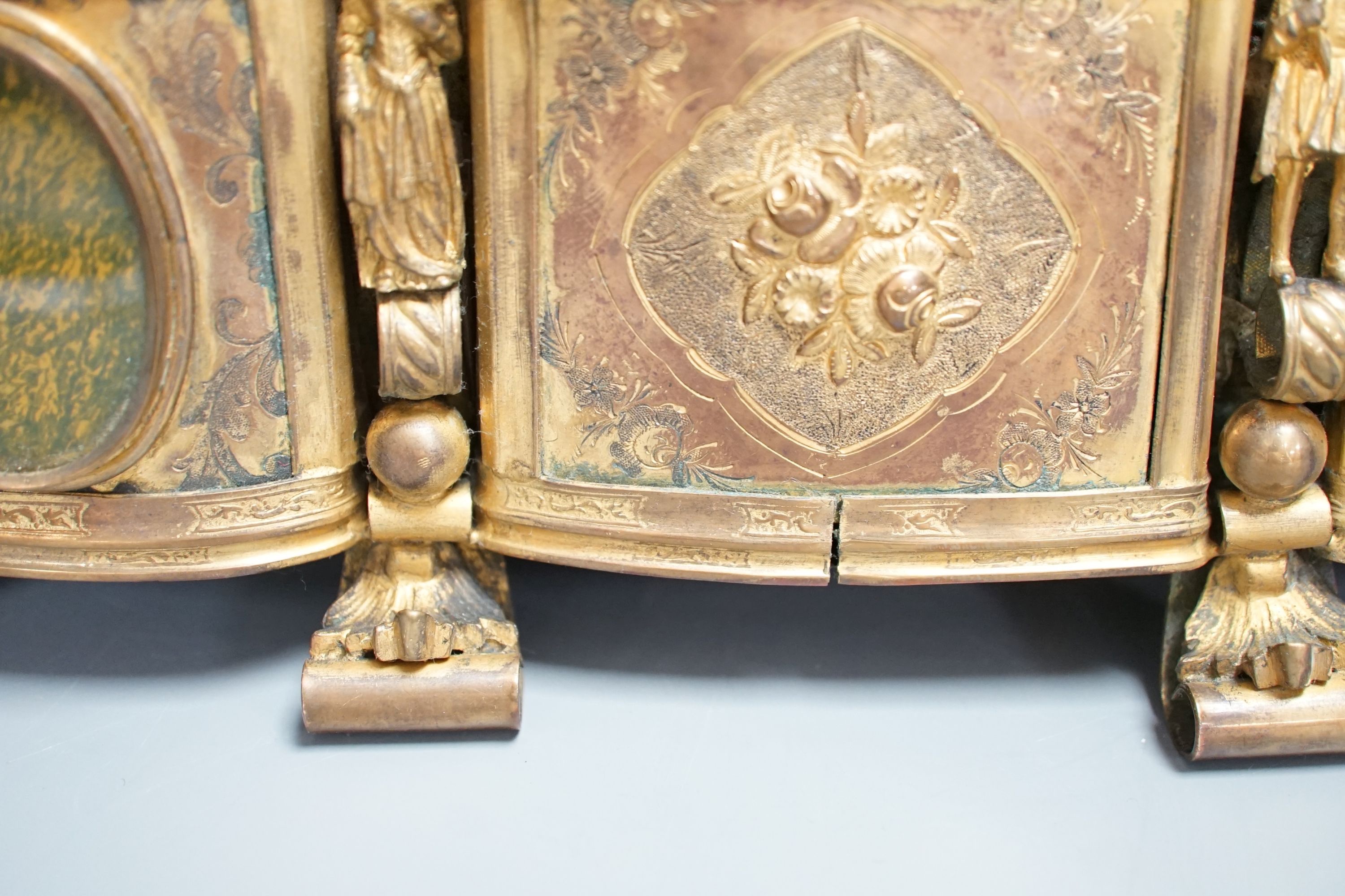 A French gilt metal casket inset with reverse painted glass panels and a pair of ormolu style candlesticks, 22.5cm tall